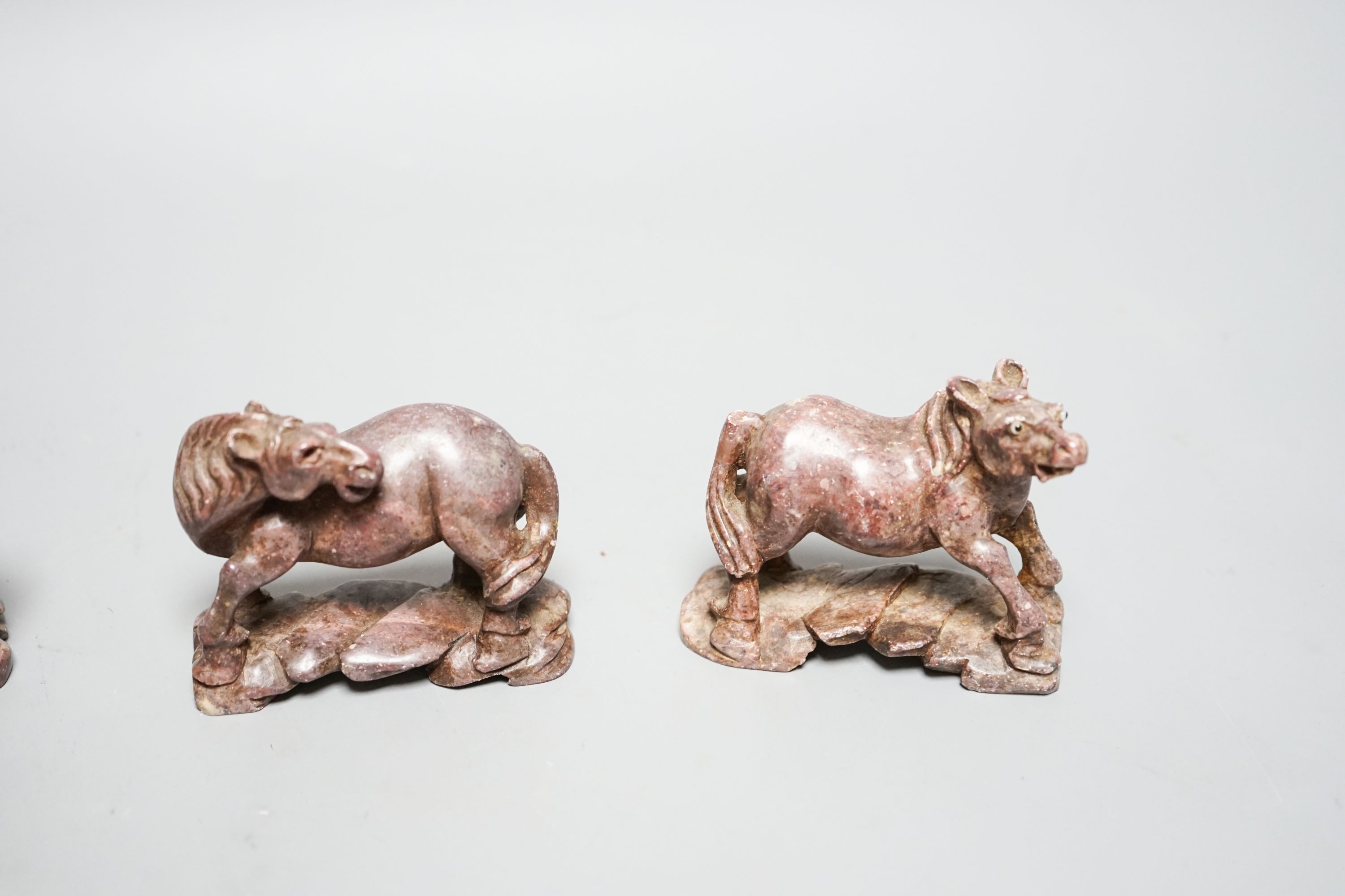 Six Chinese soapstone models of horses and a similar monkey, early 20th century